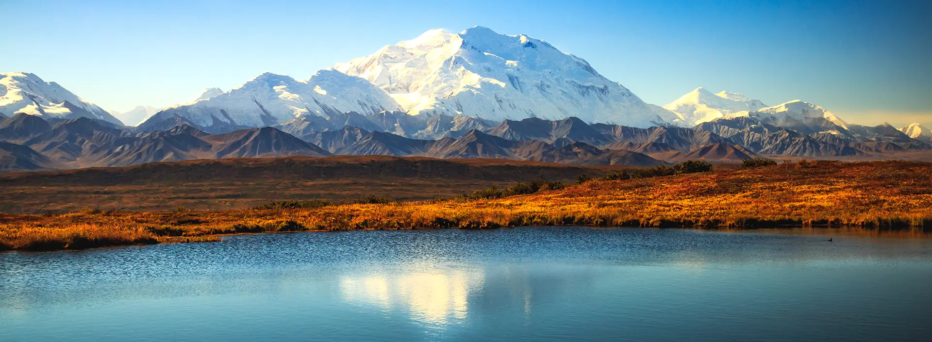 Sunrise with Denali and lake