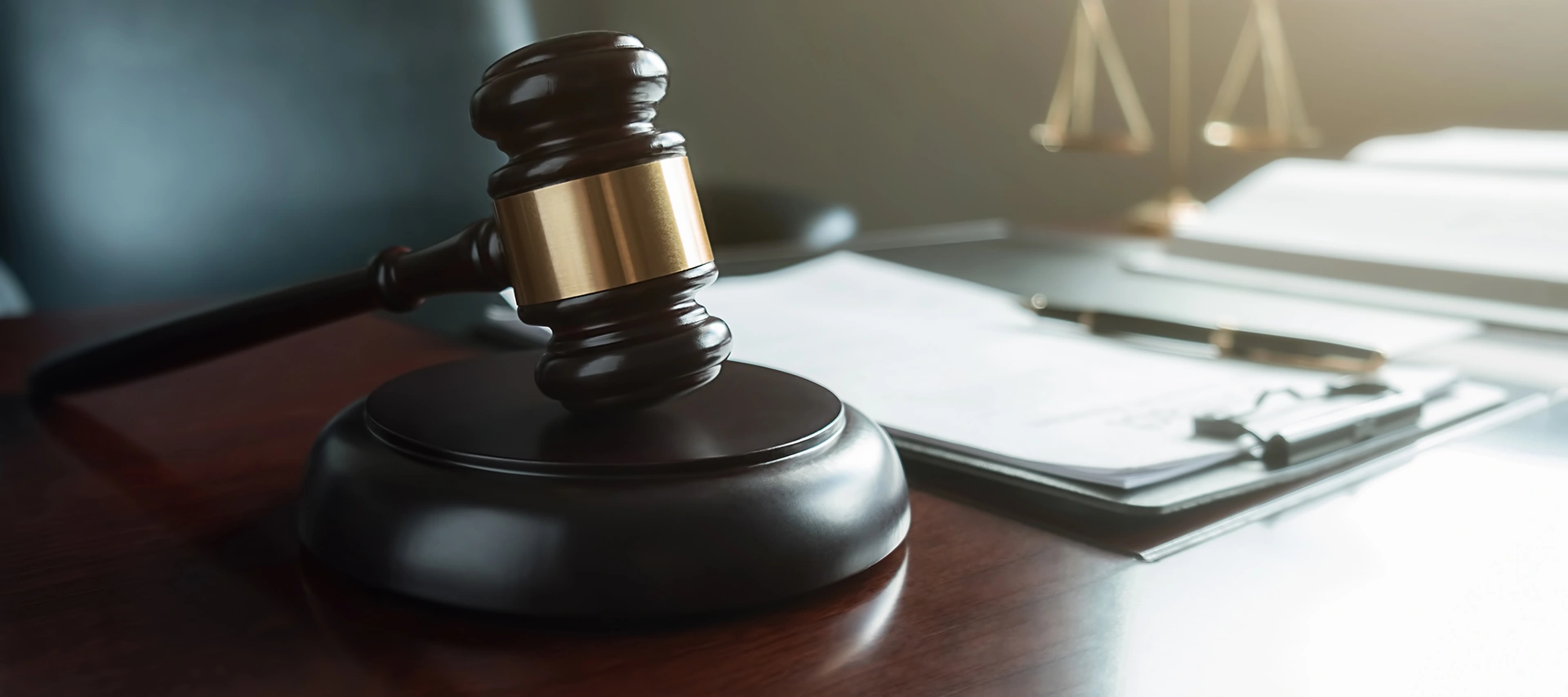 Gavel and paperwork resting on desk