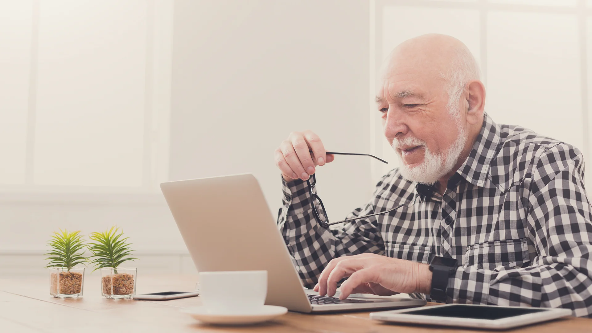 Older man working on computer