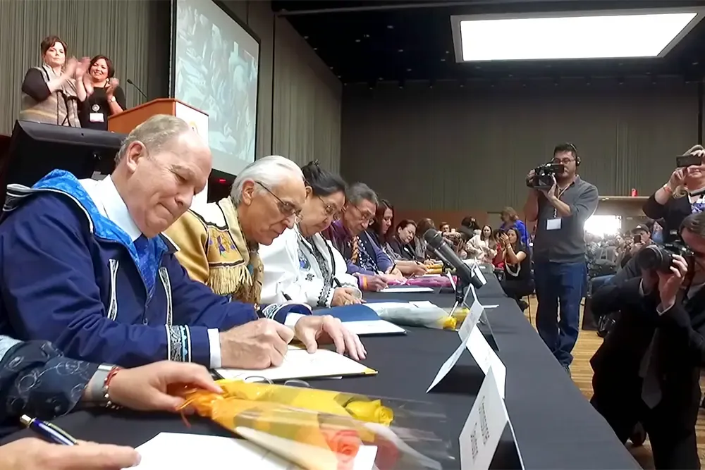Governor Walker and tribal leaders signing the Tribal Compact
