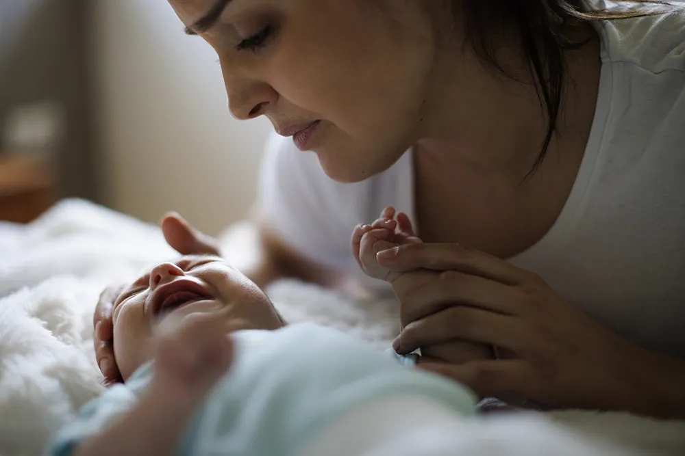 Woman worrying over crying baby