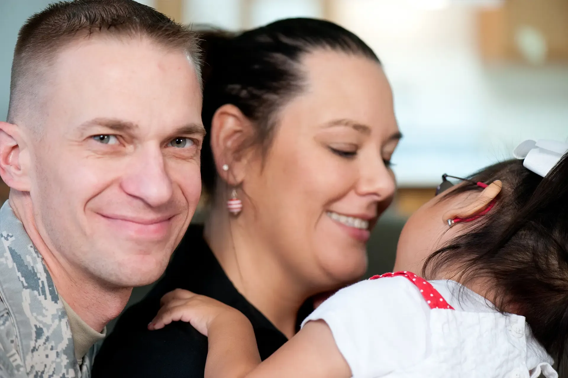 Tatiana: Happy military family closeup