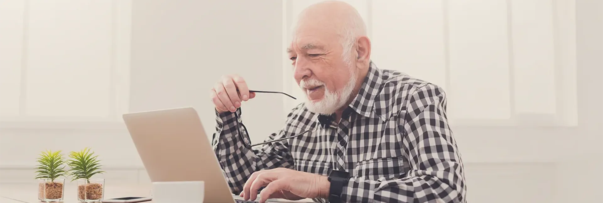 Older man working on computer