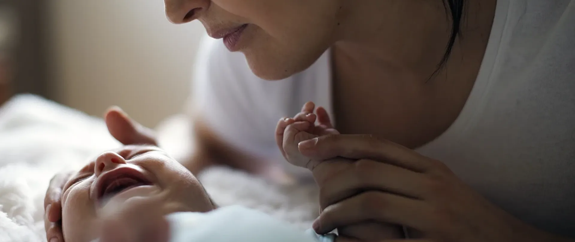 Woman worrying over crying baby