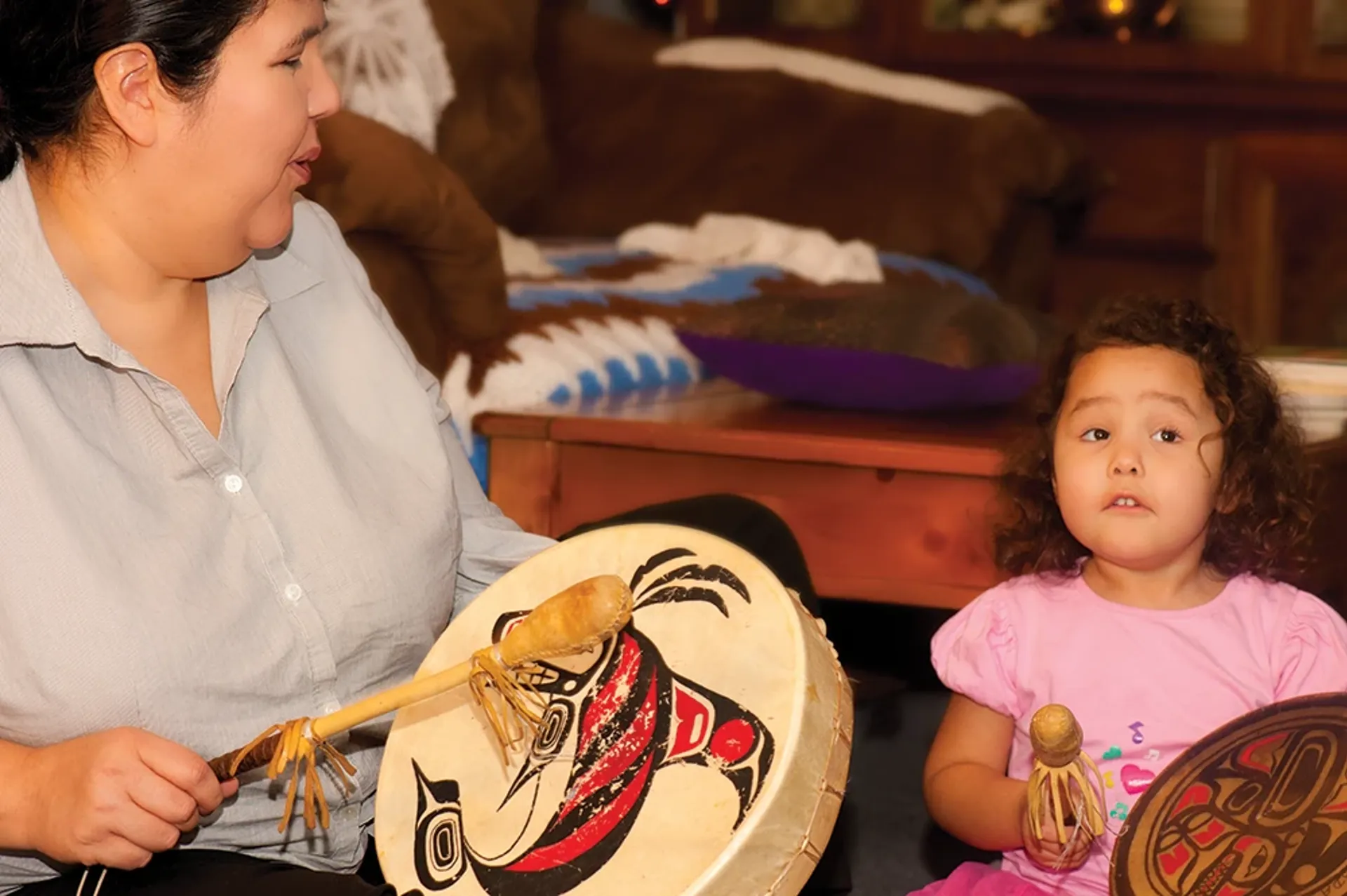 Singing and drumming, mother and child