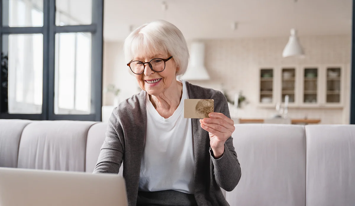 Older couple with credit card ready